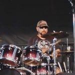 Chris playing drums at Oliver Music In The Park